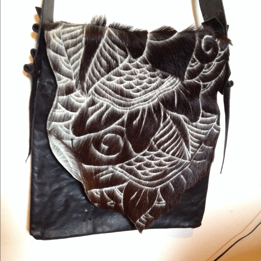 Leather dark brown messenger crossbody bag.
